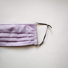 Eco-friendly face mask, face covering made with lavender 100% cotton fabric and featuring adjustable elastic ear loops